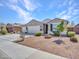 Charming single-story home with a three-car garage, desert landscaping, and excellent curb appeal at 13451 W Remuda Dr, Peoria, AZ 85383