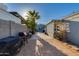 The backyard features an accessory dwelling unit and brick pavers leading to the outdoor area at 1822 N Laurel Ave, Phoenix, AZ 85007