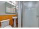 Bathroom featuring a pedestal sink, toilet and shower with glass door at 1822 N Laurel Ave, Phoenix, AZ 85007