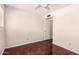 Bare bedroom with stained concrete floors, white walls, a window, and minimal electrical outlets at 1859 E Gemini Dr, Tempe, AZ 85283