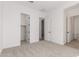 Spacious bedroom with carpet, closet, and attached bath at 20261 W Monterey Way, Buckeye, AZ 85396