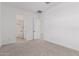 Bedroom featuring carpet, a doorway, and a closet at 20261 W Monterey Way, Buckeye, AZ 85396