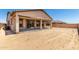 The covered patio extends the living space outdoors, great for relaxing and entertaining at 20273 W Monterey Way, Buckeye, AZ 85396