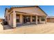 Covered patio is perfect for outdoor enjoyment with access via sliding glass doors at 20273 W Monterey Way, Buckeye, AZ 85396