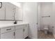 Elegant bathroom with a modern vanity, black accents, and a stylish, contemporary design at 20273 W Monterey Way, Buckeye, AZ 85396