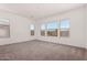 Spacious bedroom featuring large windows allowing plenty of natural light at 20273 W Monterey Way, Buckeye, AZ 85396