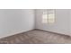Cozy bedroom with neutral carpet and ample natural light at 20273 W Monterey Way, Buckeye, AZ 85396