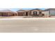 Charming home with inviting entryway, well-maintained landscaping, and a neatly paved driveway at 20273 W Monterey Way, Buckeye, AZ 85396