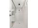 Modern shower with white tile and black fixtures at 20273 W Monterey Way, Buckeye, AZ 85396