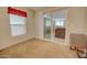 Bright living room showcasing a sliding glass door and a comfortable sofa, perfect for relaxation at 2263 N Trekell Rd # 81, Casa Grande, AZ 85122