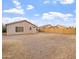 Spacious backyard area with low-maintenance desert landscaping and block wall fencing at 2323 W Carson Rd, Phoenix, AZ 85041