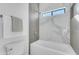 Bright bathroom with a tub and shower features modern fixtures and stylish tile work at 24417 N 87Th St, Scottsdale, AZ 85255