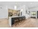 Stylish kitchen featuring a large island with seating and modern stainless steel appliances at 24417 N 87Th St, Scottsdale, AZ 85255