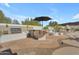 Outdoor kitchen featuring a built-in grill, bar, and stylish accents is perfect for entertaining at 24417 N 87Th St, Scottsdale, AZ 85255