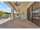 Expansive covered patio complete with ceiling fans and access to the serene pool area for outdoor enjoyment at 24417 N 87Th St, Scottsdale, AZ 85255