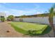 Backyard featuring a private putting green and desert landscape for a golfer's paradise at home at 24417 N 87Th St, Scottsdale, AZ 85255