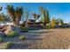 Community entrance featuring desert landscaping, native plants, and stone accents at 30600 N Pima Rd # 49, Scottsdale, AZ 85266