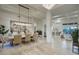 Open concept dining area with coffered ceiling and views into other living spaces at 30600 N Pima Rd # 49, Scottsdale, AZ 85266