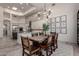 Dining room adjacent to kitchen, skylight, and ornate dining table with seating for six at 30600 N Pima Rd # 49, Scottsdale, AZ 85266