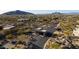 Aerial view of the neighborhood entrance and surrounding desert landscape, highlighting the community's setting at 30600 N Pima Rd # 49, Scottsdale, AZ 85266