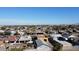 A scenic aerial perspective of a charming community, highlighting rooftops and tree canopies at 3133 W Polk St, Phoenix, AZ 85009