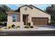 Charming single-story home with desert landscaping and a two-car garage at 41915 W Hospitality Ln, Maricopa, AZ 85138