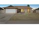 Charming single-story home with a well-maintained yard and two-car garage at 4634 W Aire Libre Ave, Glendale, AZ 85306