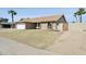 Single-story home with a cozy front yard and convenient two-car garage at 4634 W Aire Libre Ave, Glendale, AZ 85306