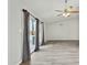 Bright living room features neutral paint, vaulted ceiling and sliding glass doors to outdoor space and pool at 4634 W Aire Libre Ave, Glendale, AZ 85306