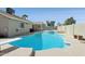 Lovely backyard pool area with an in-ground spa and diving board at 4634 W Aire Libre Ave, Glendale, AZ 85306