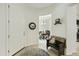 Inviting entryway with a wood bench and views of the dining area, featuring neutral tile flooring and curved archways at 4777 S Fulton Ranch Blvd # 1103, Chandler, AZ 85248