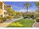 Scenic community walkway winding through lush landscaping, trees, and manicured lawns at 4777 S Fulton Ranch Blvd # 1103, Chandler, AZ 85248