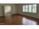 Bright living room featuring hardwood floors and ample natural light at 511 W Ocotillo Rd, Phoenix, AZ 85013