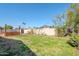 Green backyard featuring a garden bed, offering a versatile outdoor area for relaxation and activities at 516 E Gemini Dr, Tempe, AZ 85283