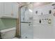 Bathroom featuring a glass-enclosed shower with storage shelves and modern fixtures at 516 E Gemini Dr, Tempe, AZ 85283