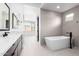 Spacious bathroom featuring a tub and a long vanity at 5724 E Moura Dr, Cave Creek, AZ 85331