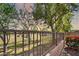 Back yard metal fence view of the community park. Perfect for an evening stroll at 6523 S 34Th Dr, Phoenix, AZ 85041