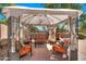 Comfortable outdoor patio with shaded pergola, ideal for relaxing or entertaining guests at 6523 S 34Th Dr, Phoenix, AZ 85041