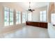 Bright living room featuring large windows and built-in cabinetry at 7722 E Fledgling Dr, Scottsdale, AZ 85255