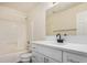 Clean and bright bathroom featuring a shower-tub combo, toilet, and white vanity with a modern black faucet at 833 W Cholla St, Casa Grande, AZ 85122