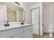 A double vanity with white cabinets providing ample space in the bathroom at 833 W Cholla St, Casa Grande, AZ 85122