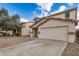 Charming two-story home with a large two car garage, neutral color scheme and low maintenance gravel yard at 833 W Cholla St, Casa Grande, AZ 85122