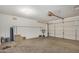 Spacious garage area with garage door, ready for vehicle storage and various projects at 833 W Cholla St, Casa Grande, AZ 85122