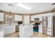 Bright kitchen with stainless steel appliances and white cabinetry offering a clean aesthetic at 833 W Cholla St, Casa Grande, AZ 85122