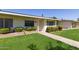 Inviting home exterior with lush landscaping, creating a welcoming and serene atmosphere at 9231 N 111Th Ave, Sun City, AZ 85351