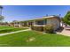 Pleasant townhome featuring tidy landscaping and well-kept grounds for a comfortable living environment at 9231 N 111Th Ave, Sun City, AZ 85351