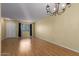 Inviting living room with wood floors, natural light, and a cozy atmosphere at 9231 N 111Th Ave, Sun City, AZ 85351