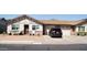 Charming home with a neatly landscaped front yard and attached two-car garage, offering curb appeal and convenience at 10112 N 96Th Ave # A, Peoria, AZ 85345