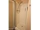 Shower stall with a detachable shower head and textured walls at 10112 N 96Th Ave # A, Peoria, AZ 85345