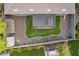 Aerial view showcasing backyard landscaping, turf, gravel and a covered patio at 10246 W Oberlin Way, Peoria, AZ 85383